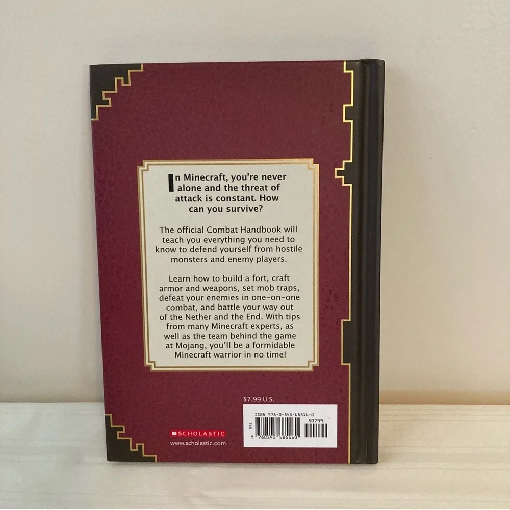 Minecraft Combat Handbook Hardcover by Mojang 2014